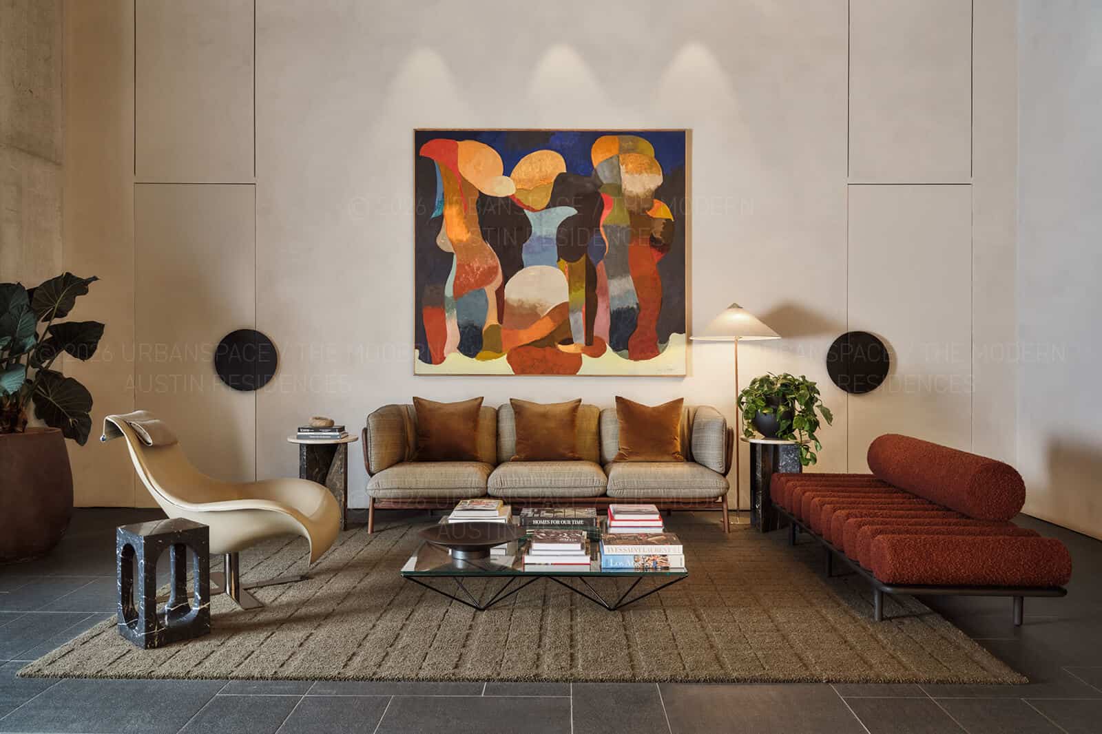 Lobby seating group with a large abstract painting and specimen plants