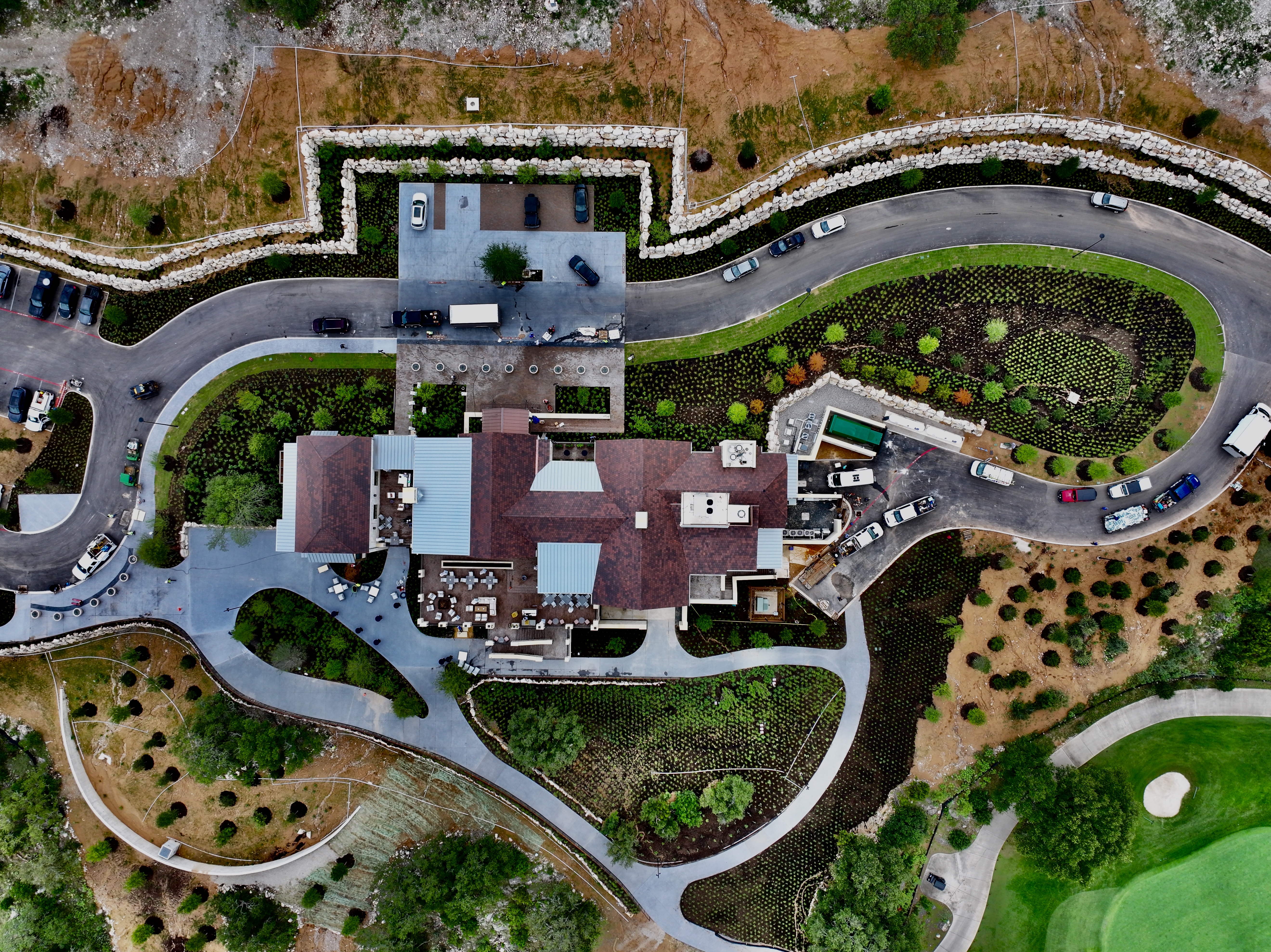 Plan-view aerial directly above the clubhouse showing bed edges, walks and wall alignments